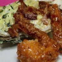 Oyster Dinner · Plum oysters fried to perfection with homemade coleslaw and pink lady dipping sauce.