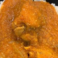 White Rice With Goatmeat Stew · Served with freshly made stew and served with stewed goatmeat