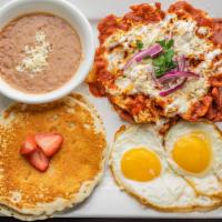 El Amigo* · Chicken chilaquiles, 2 eggs, refried beans and pancakes. Consuming raw or undercooked meats,...