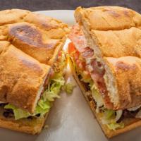Tortas · Lettuce, cheese, mayo, tomatoes, jalapeños and onions.
