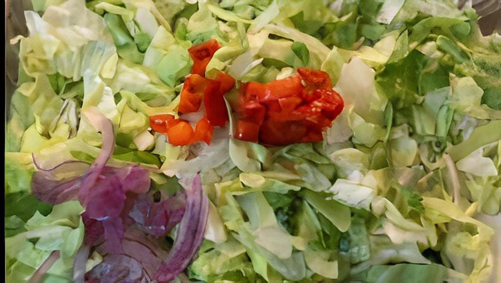 House Salad · Lettuce Mix, Pimento, Romaine and Iceberg, shaved red onion, and Provel cheese with our house dressing.