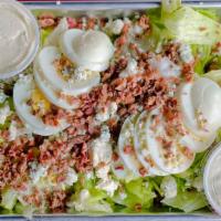 Faucon Salad · Lettuce Mix, Boiled egg, bacon, and bleu cheese crumbles. Served with Bleu Cheese Dressing.