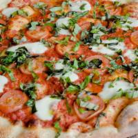 Margherita Pizza (Large) · Fresh basil, fresh mozzarella, Roma tomatoes drizzled with evoo.