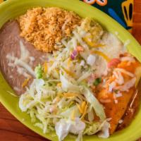 Enchiladas Tres Marias · Three enchiladas - chicken with green tomatillo sauce, ground beef with red poblano sauce an...