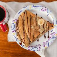 Bananas And Nutella Crepe · It's no surprise that the Bananas and Nutella Crepe is the most popular--- nothing goes bett...