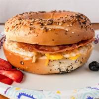 Ham Egg Cheese Bagel Sammich · Thin sliced ham egg and cheese on bagel— choose bagel type