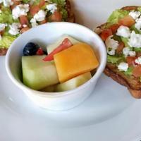 Avocado Toast · New, vegetarian. Mashed avocado mixed with our lemon garlic dressing spread over two pieces ...