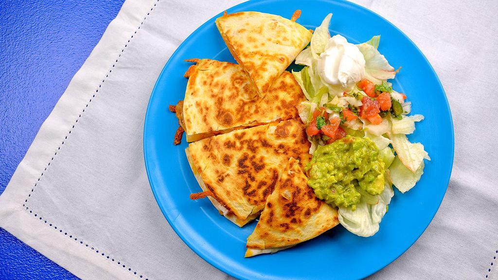 Quesadilla · Toasted flour tortilla with melted cheese, pico de gallo, and your choice of Steak, or chicken. Served with shredded lettuce, guacamole and sour cream on the side.