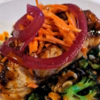 Resolution Bowl · Sauteed quinoa, broccoli scallions and toasted walnuts drizzled with spicy peanut sauce topp...