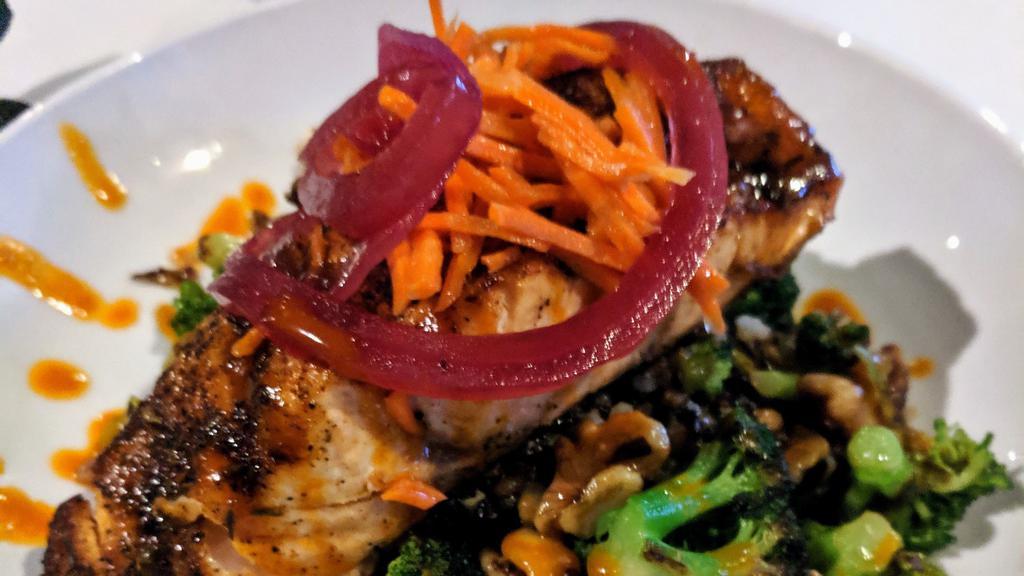 Resolution Bowl · Sauteed quinoa, broccoli scallions and toasted walnuts drizzled with spicy peanut sauce topped with pickled carrots and onions. Vegetarian or add a protein of your choice.
