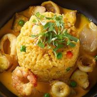 Arroz Con Mariscos · Jasmine Rice, Octopus, Shrimp, Scallops, Squid, Aji Panca, Miso, Parmesan Cheese
