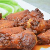 8 Pieces Chicken Wings · Your choice of buffalo wing sauce mild or BBQ sauce.