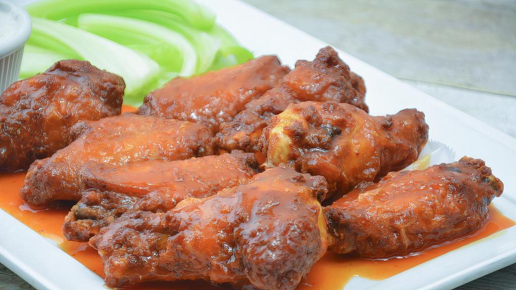 8 Pieces Chicken Wings · Your choice of buffalo wing sauce mild or BBQ sauce.