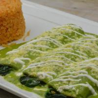 Spinach Enchiladas · 3 corn tortillas with spinach, topped with our delicious poblano salsa, and queso fresco. Se...