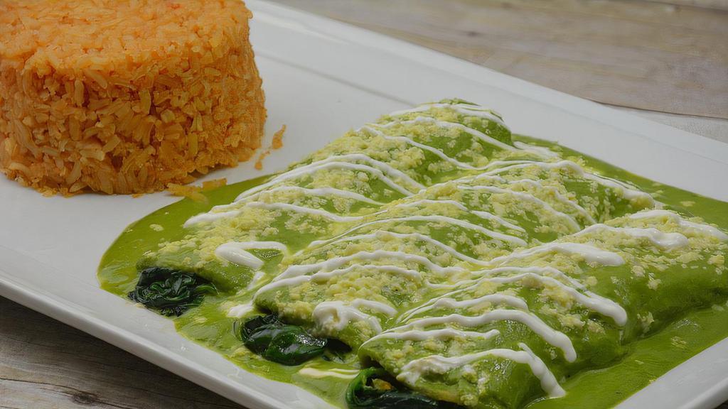 Spinach Enchiladas · 3 corn tortillas with spinach, topped with our delicious poblano salsa, and queso fresco. Served with rice.