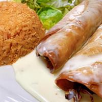 Chimichanga · 2 deep fried burritos, filled with choice of chicken or beef, served with rice, beans, lettu...