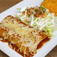 Lunch Enchiladas Supremas · 1 chicken and 1 beef enchilada, topped with enchilada sauce and sprinkled cheese. Served wit...