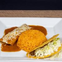 Speedy Gonzales Lunch · 1 beef enchilada and 1 beef taco, served with your choice of rice or refried beans with chee...