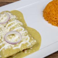Enchiladas Suizas Lunch · 2 chicken enchiladas topped with creamy tomatillo sauce, queso fresco, and sour cream. Serve...