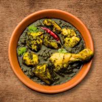 Green Dream Chicken · Tenders of chicken cooked to perfection in a thick ginger, garlic and cream-spinach gravy
