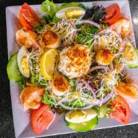 Grilled Salad · Spring mix, topped with choice of protein - blackened, grilled or fried. Chicken, shrimp, tu...