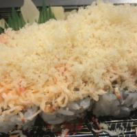 Dynamite · shrimp tempura roll topped w/
baked crab salad & crunchy flakes