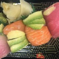 Rainbow · crab & avocado roll topped w/
tuna, salmon, yellowtail & avocado
