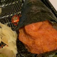 Spicy Tuna Hand Roll · A hand roll is a cone shaped roll that is one large piece. Meant to be eaten with your hands!