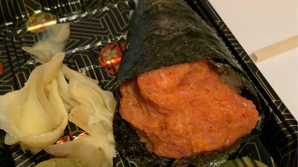 Spicy Tuna Hand Roll · A hand roll is a cone shaped roll that is one large piece. Meant to be eaten with your hands!