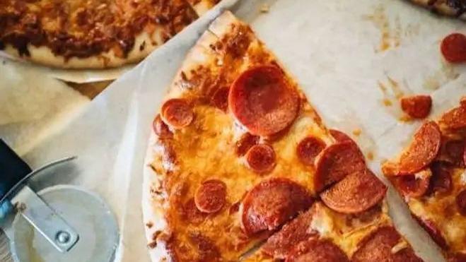 Pepperoni Pizza · Marinara, mozzarella, and pepperoni.