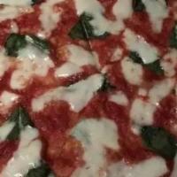 Margherita Pizza · Marinara, fresh mozzarella, and fresh basil.