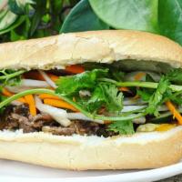 Banh Mi Sandwich · French style baguette with pickled carrot, cucumber, cilantro and jalapeno pepper. Your choi...