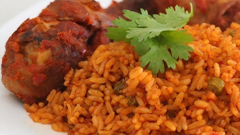 Jollof Rice With Chicken · Plantain depends on availability.