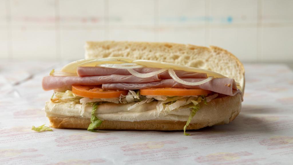 Ham & Cheese Sub (Whole) · 98% fat-free, low salt, fresh provolone cheese, lettuce, tomato, onions, spices, oil, and vinegar.