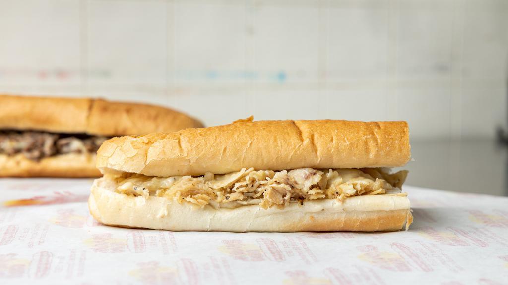 Philly Chicken & Cheese Sub (Whole) · Comes with grilled onions and tender chicken breast with white American cheese.