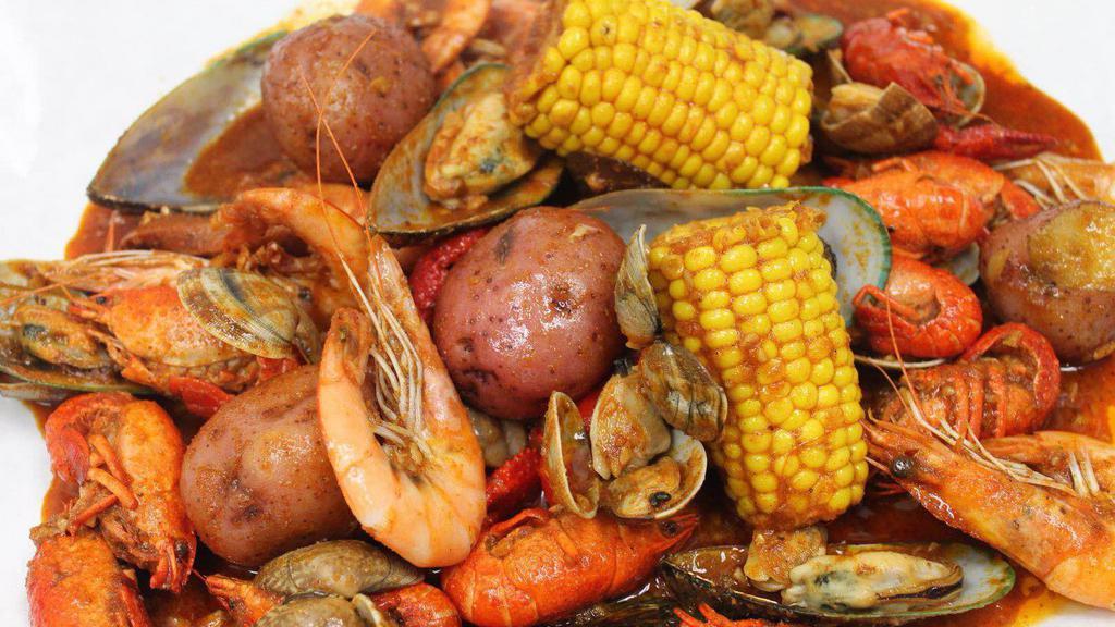 Combo #1 * · Includes: shrimp, crawfish, clams, mussels, corn on the cob, potatoes, sausage. mixed with sauce of your choice.
