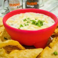 Queso Dip · Homemade Queso Dip With Yellow Corn Chips