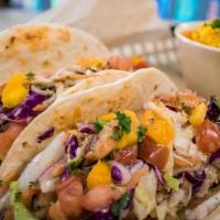 Fish Tacos · something's fishy around here and it's not just your breath. These delicious fish tacos are ...