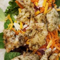 Charcoal Grilled Chicken  Wrap · Chicken Wrap filled with Spring Mix, Tomatoes, Carrots, Cheese Mix, and our famous Cilantro ...
