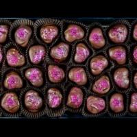 Strawberry Truffles - 6 Pieces · 1/2 dozen Strawberry Truffles - Chocolate ganache infused with strawberries and dipped in a ...