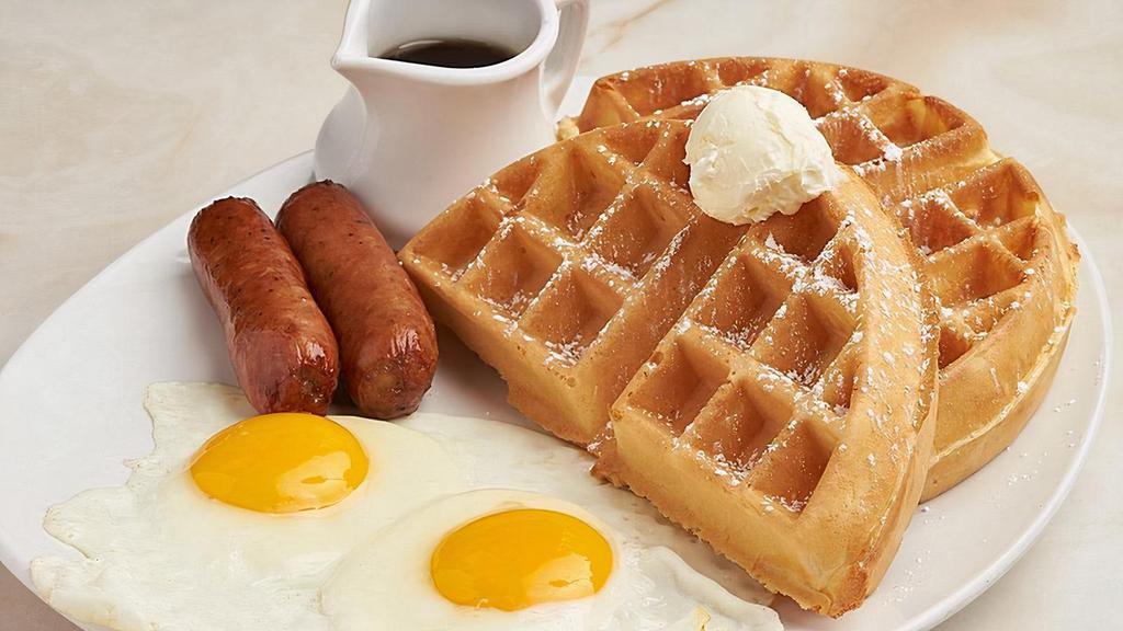Belgian Waffle & Eggs  · Powdered sugar, whipped butter, farm fresh Amish eggs any style, choice of meat
