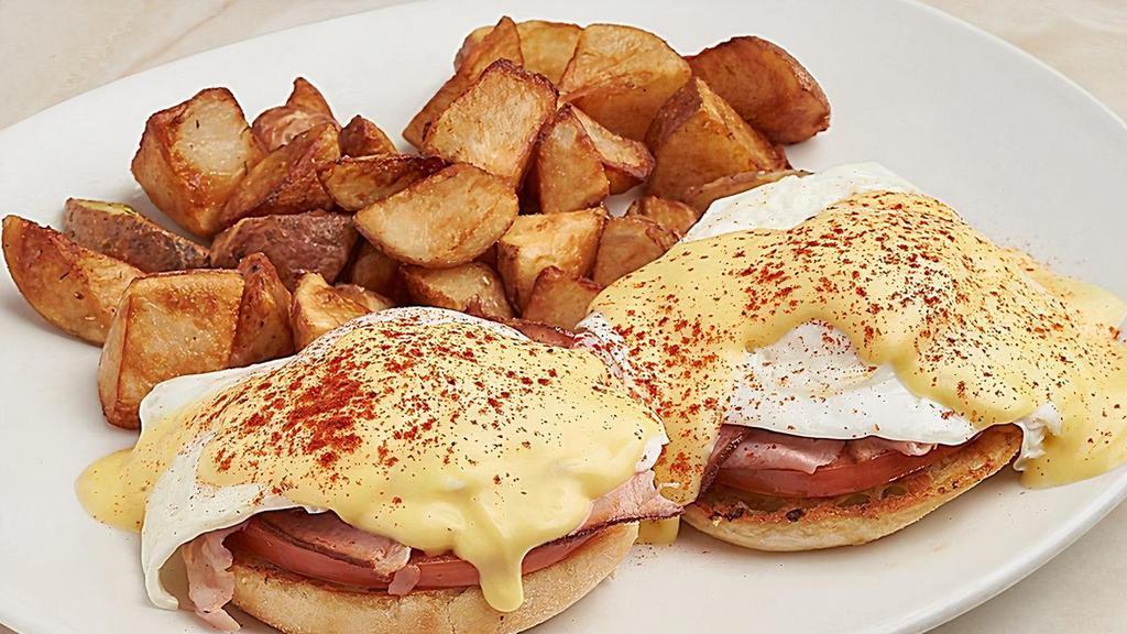Classic Eggs Benedict · Wolferman’s English muffin, maple ham, tomatoes, cage free Amish eggs over easy, hollandaise, home fries.