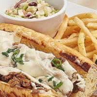 Ribeye Philly Steak · Caramelized onions, white American cheese, mayo, scallions, sweet potato sub roll, side of h...