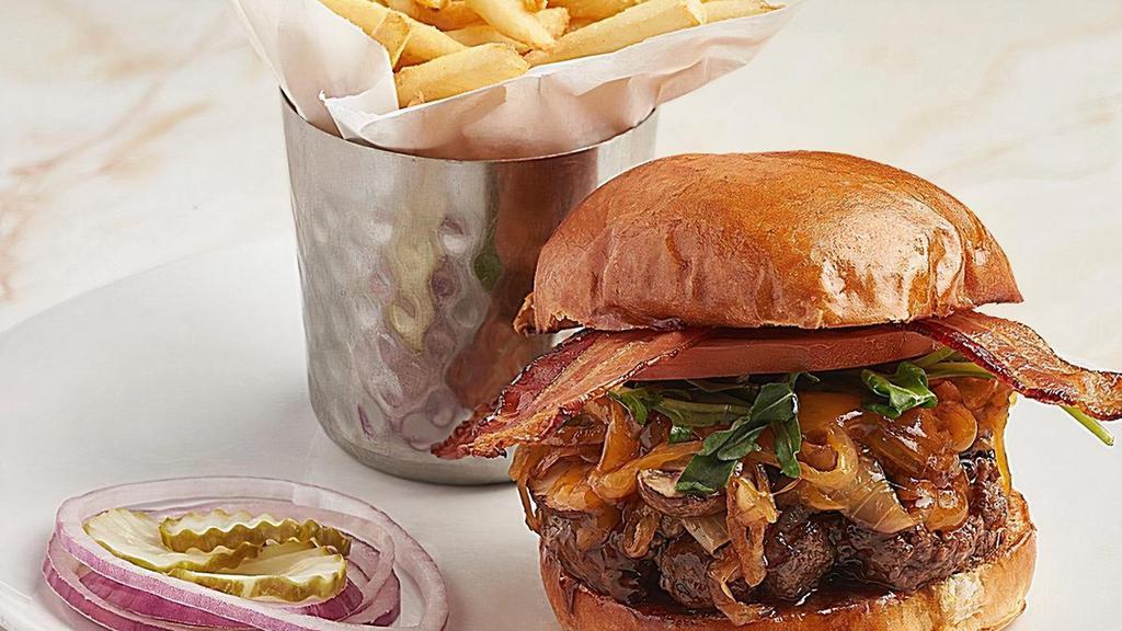 Smokehouse Burger · BBQ basted, cheddar, caramelized onions, cremini mushrooms, nitrate-free bacon.