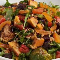 Warm Roasted Local Veggie Salad · Beets, squash, brussel sprouts, red peppers, basil, rocket greens, kale, sunflower seeds, pe...
