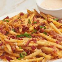 Cheese Fries · Old Bay, jack cheddar, bacon, scallions, southwest ranch..