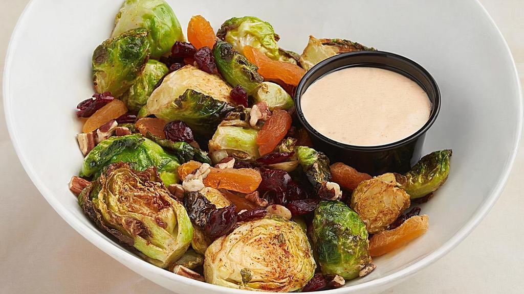 Crispy Fried Brussel Sprouts · Cinnamon chipotle seasoned, dried apricots and cranberries, pecans, southwest ranch..