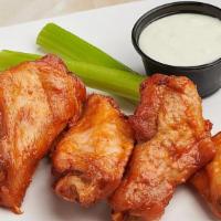 Buffalo Wings (5) · Organic wings, roasted in-house, then fried, with celery, and bleu cheese dressing..