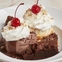 Brownie Decadence · Chewy fudge brownie topped with all-natural Breyers vanilla and chocolate ice cream, hot fud...