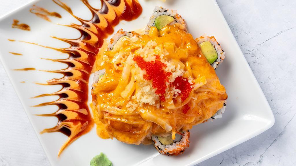 Volcano Roll · California Roll + scallop, crab, squid,, baked in spicy aioli, masago.